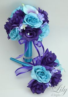 the bridal bouquet is purple and blue with flowers on it, along with ribbons