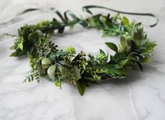 Our signature handmade Misty crown is the perfect accessory to wear to a barn wedding or forest themed wedding. This design is one of our best sellers and can really create a statement headpiece. The mix of intertwined artificial leaves, ferns and twigs gives a relaxed earthy feel that will create the wow factor. Why buy from Innocent Chaos? At Innocent Chaos we carefully select each of our flowers by hand to make sure that your delicate designs carry the highest level of quality. Each of our cr Boho Flower Crown Wedding, Flower Crown Green, Green Flower Crown, Woodland Crown, Gold Bridal Crowns, Roses Photography, Green Crown, Flower Wreath Hair, Daydream Believer