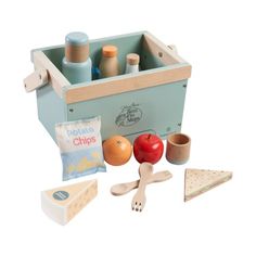 an assortment of wooden toys including cheese, tomatoes and meats in a blue box