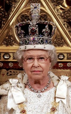 the queen of england in her coronation dress and tiara