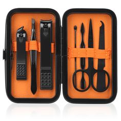 PRICES MAY VARY. [Men Women Manicure Set] With a unique black + orange color scheme, this nail clipper set is suitable for both men and women. Multifunctional travel manicure set includes hand care,facial care,foot care tools(Contains large nail clippers, small oblique nail clippers, eyebrow scissors, eyebrow tweezer, ear pick, nail file, nail cleaner, portable travel PU case). [Small and Convenient] Our nail grooming kit with a portable PU leather case that is easily opened/closed simply by a p Men Nail, Basic Nail, Anniversary Gift For Friends, Stocking Stuffers For Men, Tweezers Eyebrows, Basic Nails, Pedicure Kit, Manicure Kit, Tool Gifts