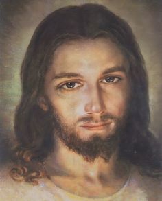 the face of jesus with long hair and beard