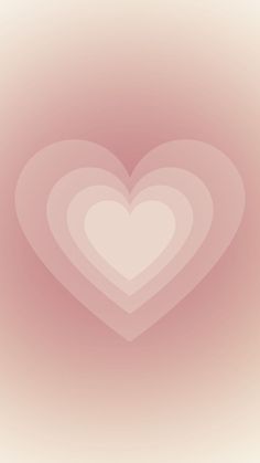 a heart shaped object on a pink background