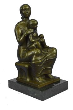 a bronze statue of a woman holding a baby in her lap and sitting on a bench