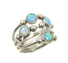 Visit the shop: https://www.etsy.com/shop/MayaOr Silver opal ring. spheres sterling silver ring, Sterling silver ring. Opal ring. Opal silver ring. Wide opal ring. Wide ring.(sr10019) ▶▶ Opal is a stone of inspiration which enhances imagination and creativity. It can bring inspiration to Silver Moonstone Ring With Ethiopian Opal, Silver Ethiopian Opal Ring With Cabochon, Silver Round Opal Ring, Unique Silver Ethiopian Opal Ring, Silver Ethiopian Opal Ring, Silver Opal Cabochon Ring, Silver Ethiopian Opal Ring With Gemstone, Ethiopian Opal Silver Gemstone Rings, Silver Opal Ring