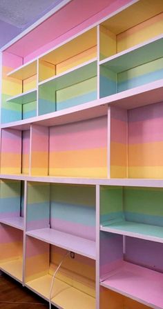 the shelves are painted in different colors