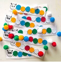 the very hungry caterpillar bookmarks are made with pom - poms