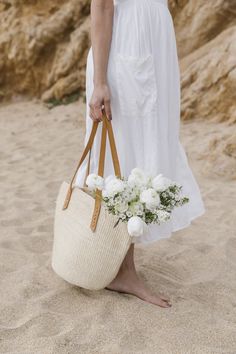 This cute and creamy Woven Sisal tote is the perfect size for your daytime outings. Roomy enough for your daily necessities, and a bouquet of course! Summer Cream Straw Bag With Woven Leather, White Natural Fiber Tote Beach Bag, Everyday Neutral Straw Bag With Leather Handles, Everyday Cream Summer Beach Bag, Handwoven Cream Straw Bag For Everyday Use, Cream Handwoven Straw Bag For Everyday Use, Everyday Beige Woven Leather Beach Bag, Everyday Cream Woven Beach Bag, Beige Woven Leather Beach Bag For Everyday