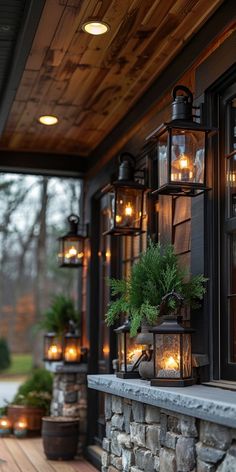 lanterns are lit on the front porch of a house