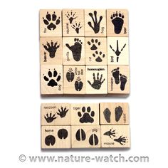 two wooden stamps with hand prints on them