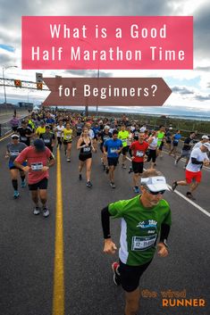 people running in a marathon with the words what is a good half marathon time for beginners?