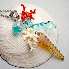 Hey, I found this really awesome Etsy listing at https://www.etsy.com/listing/237450447/red-ivory-coral-lampwork-pendant-sea Ocean-inspired Colorful Beads Necklace For Gift, Ocean-inspired Colorful Beads Necklace Gift, Ocean-inspired Colorful Bead Necklaces For Gifts, Gift Ocean-inspired Colorful Beads Necklace, Ocean-inspired Colorful Beads For Jewelry Making, Handmade Ocean Color Necklaces For Jewelry Making, Colorful Beaded Recycled Glass Jewelry As Gift, Colorful Recycled Glass Bead Jewelry As Gift, Recycled Glass Colorful Beaded Jewelry As Gift