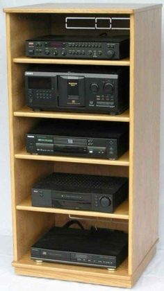 an entertainment center with several different types of electronics