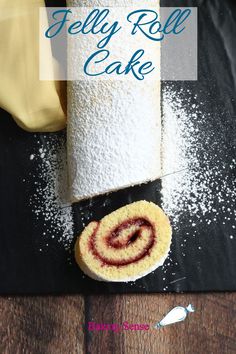 jelly roll cake with powdered sugar on top