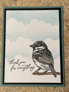 a card with a bird sitting on top of it