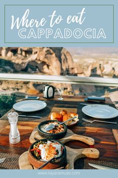 a table with plates and utensils on it that says where to eat cappadocia