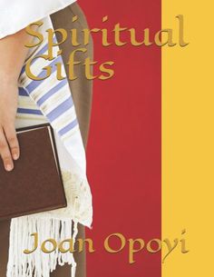 a person holding a book in their hand with the words, spiritful gifts written on it