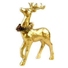 a gold reindeer ornament with pine cones on it's antelope