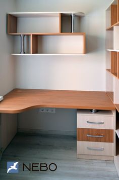 an office desk with shelves and drawers in the corner