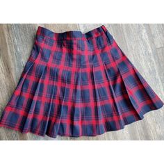 Elevate Your Teen's Wardrobe With This Classic Yet Trendy Red And Blue Plaid Skirt From Bibi Duo. The Pleated Style Adds A Touch Of Sophistication, Making It A Perfect Fit For Causal Occasions. The Elastic Waist Ensures A Comfortable Fit, And The Skirt Length Is Just Right For A Stylish Look. Made Of High-Quality Polyester With A Rayon Fabric Type, This Skirt Is Machine Washable And Easy To Care For. It Features Accents Of Pleats And A Zip Closure. Whether It's For A School Uniform Or A 90s-Them Preppy Red Fitted Skort, Winter School Bottoms: Lined Skirt, Red Fitted School Uniform Skirt, Fitted Red School Uniform Skirt, Winter School Lined Skirt, Pleated Plaid Skirt, Blue Plaid Skirt, School Skirt, Plaid Skirt