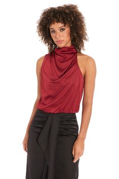 Discover the perfect balance of comfort and style with our Astoria sleeveless turtleneck blouse. This chic separate features a sophisticated high cowl neck and a gently bloused bodice that flatters every figure. Whether you're attending a networking event, enjoying a weekend brunch, or heading to a romantic dinner, the Astoria top adapts effortlessly to any setting. Tuck it into high-waisted trousers for a streamlined look, or let it flow over your favorite jeans for casual elegance. The Astoria Turtleneck Blouse, Let It Flow, Sleeveless Turtleneck, Romantic Dinner, Weekend Brunch, Networking Event, High Waisted Trousers, Casual Elegance, Office Outfits