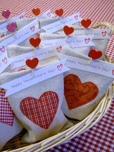 valentine's day tea bags in a basket on a table with red and white checkered cloth