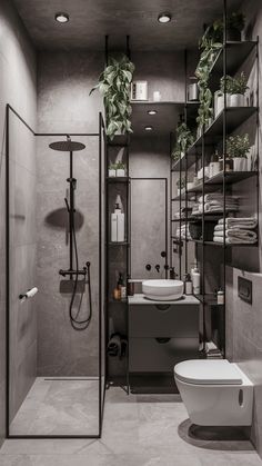 a bathroom with a toilet, sink and shower in it's stall area is shown