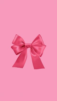 a pink bow on a pink background