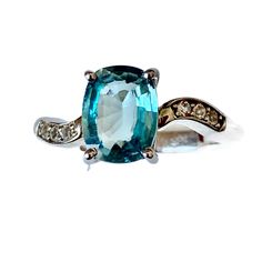 3.15ct of Ratanakiri Blue Zircon & White Topaz  UK Ring Size P-Q Set In 925 Sterling Silver White Zircon -0.12ct Shape -Cushion Cut- Fancy  Dimensions- 7.00mm x 9.00mm Fine Jewelry Aquamarine Ring With Diamond Accents, Aquamarine Rings With Diamond Accents, Aquamarine Ring With Accent Stones, Aquamarine Gemstones With Accent Stones, Sapphire Rings With Diamond Accents And Aquamarine, Aquamarine Rings With Sapphire Color And Diamond Accents, Fine Jewelry Turquoise Sapphire Ring With Accent Stones, White Gold Rings With Aquamarine Gemstone Accents, White Gold Aquamarine Ring With Gemstone Accents