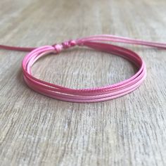 Adjustable Bracelets With Nylon Cord, Adjustable Pink Friendship Bracelets In Nylon Cord, Pink Adjustable Friendship Bracelets Made Of Nylon Cord, Adjustable Pink Friendship Bracelets Made Of Nylon Cord, Trendy Braided Bracelet With Adjustable Cord, Trendy Pink Braided Bracelet With Adjustable Cord, Pink Friendship Bracelets With Adjustable Cord, Pink Friendship Bracelet With Adjustable Cord, Casual Pink Braided Bracelet With Adjustable Cord