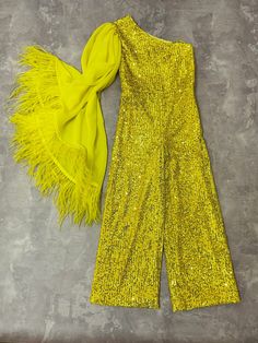 Yellow sequins pageant one sleeve girls jumpsuit with feathers/ Girls pageant runway outfit/ Custom pageant outfit This beautiful outfit is made from high quality chiffon and sequins. The sequins shine with different colors. The outfit has natural lining and zipper back. It is easy to care and comfortable to wear. It decorated ostrich feathers.The outfit is perfect for pageant events. It is absolutely stunning on! Materials Viscose, chiffon, sequins, feathers Colors and sizes The romper can be m Sequin Jumpsuits For Costume Party, Sequined Jumpsuits For Costume Parties, Sequin Jumpsuits And Rompers For Costume Party, Festive Party Jumpsuits And Rompers With Sequins, Festive Sequined Party Jumpsuits And Rompers, Festive Sequin Jumpsuits And Rompers For Party, Summer Festive Sequined Jumpsuits And Rompers, Sequin Jumpsuits And Rompers For Wedding And Party Season, Jumpsuit With Feathers