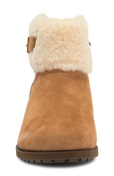 A folded cuff and lug sole bring cool style to a versatile boot made extra cozy with a lining of soft genuine shearling and warm UGGpure. UGGpure is a textile made entirely from wool to feel and wear like genuine shearling. 1 1/2" heel Leather upper/genuine shearling and UGGpure wool lining/rubber sole Imported Brooks Running Shoes Women, Tumi Luggage, Brooks Running Shoes, Cozy Boots, Tom Ford Sunglasses, Boot Cuffs, Flip Flop Slippers, Sweaters And Leggings, Comfortable Sandals