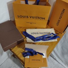 This Bundle Contains 2 Boxes, 1 Gift Bag, 1 Wallet Duster Bag And A Gift Card Holder With 2 Lv Ribbons. There Is Some Small Staining On The Bottom Of The Gift Bag, The Orange Box Has A Ripped Corner And There Are A Couple Of Small Scuffs On The Top Of The Brown Box. From A Smoke Free Home. Measurements Included In Pictures. Louis Vuitton Gift, Louis Vuitton Gifts, Louis Vuitton Paris, Orange Box, Orange Boxes, Bags Louis Vuitton, Brown Box, Gift Card Holder, Louis Vuitton Bags