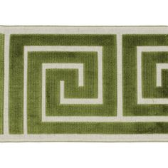 a rug with green and white squares on it