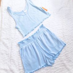 Incredibly Soft & Light Set. Crop Tank Top Scoop Neck Wide Straps Appx Flat Measure 16" X 16" Elastic Paperbag Waist Shorts On Seam Pockets Lettuce Hem Appx Flat Measure 14" Across Waist 13" Long At Side Seam 1 3/4" Inseam Hot Summer Nights Baby Blue Matching Set Matching Knit Set Lounge Wear Short Set 2 Piece Paper Bag Shorts Crop Tank Top Blue Summer Top, Short Length, Blue Summer Top In Short Length, Summer Blue Top In Short Length, Comfortable Blue Tops For Vacation, Light Wash Tops For Summer Loungewear, Light Wash Tops For Loungewear, Blue Casual Top With Short Length, Lounge Wear Shorts, Knit Lounge Set