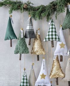 christmas tree ornaments hanging on a wall