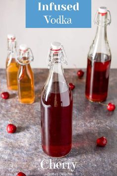 cranberry infused vodka in glass bottles with cherries around it and text overlay