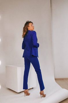 2-piece womens blazer trouser suit for office, business meetings, formal events and special occasions. Also perfectly combines with sneakers so after a long and tiring business day you can change you heels to sneakers and still look chic. DETAILS - slim fit pants - with crease - high rise - blazer is buttoned - lined - front pockets - slim fit MATERIAL Premium quality suiting fabric SIZES The models in photos are wearing a size S Available in 4 sizes: XS= 0-4 US numeric BUST 32-34 inches or 82-8 Professional Blue Suits For Career, Professional Blue Career Suits, Blue Blazer With Suit Collar For Work, Royal Blue Notch Lapel Suits For Work, Blue Long Sleeve Career Suits, Blue Office Lady Blazer For Work, Blue Professional Blazer For Career, Fitted Blue Blazer For Career, Blue Career Blazer With Suit Collar