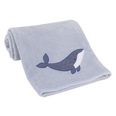 a blanket with a whale on it