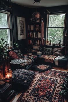 a living room filled with lots of furniture and rugs