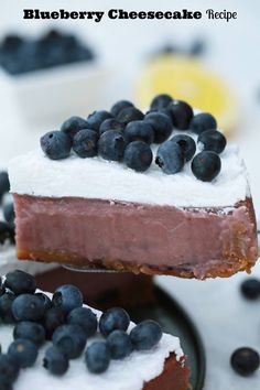 a slice of blueberry cheesecake on a plate