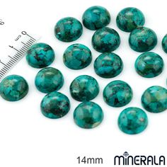 turquoise green round beads are shown next to a ruler