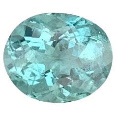 an aqua green diamond on a white background