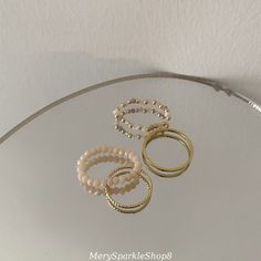 Enhance your style with our 4-Piece Gold Beaded Stackable Ring Set. Featuring natural crystal surfaces, these elegant rings are perfect for everyday wear or as a thoughtful gift. Available in green, blue, and off-white.#4-piece #gold #beaded #stackable #set #natural #ring #flexible #rings #dainty #gift #love #jewelry #setlife #beauty #flexibility #handmade #bracelets #film #nature #fitness #delicate #christmas #fashion #beads #handmadejewelry #losangeles #yoga #giftideas #silver #fashiontrend #2 Minimalist Everyday Beaded Rings, Minimalist Beaded Round Rings, Film Nature, Stackable Ring Sets, Crystal Shapes, Gold Ring Stack, Set Ring, Ring Blue, Green Crystal