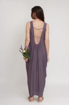 Brand: Mod Ref Open back maxi dress with exaggerated draping on both sides. ♡ Details Color: Purple Draping sides, slightly tapered towards bottom Open back Lined 96% Rayon, 4% Spandex Hand wash Sizing Model Info: Height 5'3"| Bust 32"| Waist 25"| Hips 34" Model is wearing a size medium Fit: Relaxed fit Stretch: More stretch MEASUREMENTS: S: Bust = 33" | Length = 49.5" M: Bust = 35" | Length = 50" L: Bust = 37" | Length = 51" Open Back Maxi Dress, Knit Outerwear, Knit Denim, Jumpsuit Shorts Rompers, Sleeveless Bodysuit, 20's Dress, Short Jumpsuit, Romper With Skirt, New Arrival Dress