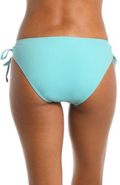 Classic bikini bottoms are charmed by bead-tipped ties at the sides that adjust to the perfect fit and look for you. Full back coverage Lined 83% nylon, 17% elastane Hand wash, line dry Imported Blue Swimwear With Side Ties For Beach, Blue Swimwear With Side Ties For Sunbathing, Blue Side Ties Swimwear For Beach, Tie-side Bottom Swimwear For Pool, Adjustable Beachwear Bottoms For Pool, Swimming Tie-side Bottoms With String Tie, String Tie Bottoms For Pool And Beach Season, Tie-side Bottoms With String Tie For Swimming, Nylon Tie-side Bottoms For Beach