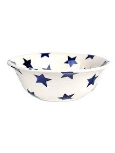 a white bowl with blue stars on it