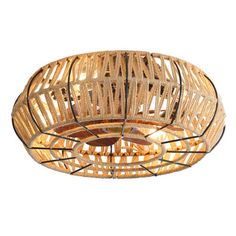 a light fixture made out of woven material with an intricate design on the top and bottom