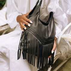 Have you always dreamed of a magnificent Boho bag with fringes that dance with your every movement? Dear, you're going to love our Wild Boho Dancing Fringe Shoulder Bag – simply a must-have Boho fringe bag that will be an eye-catcher wherever you go! Crafted from a gorgeous soft lamb leather with rich hues, this stunning Boho fringe bag features an exquisite detailed handwoven design, with stylish braided straps and amazing long fringes for a chic and whimsical Wild Boho style! ~ We absolutely l Chic Fringe Hobo Bag For Travel, Evening Tote Bag With Fringe, Chic Fringe Hobo Bag For Everyday, Elegant Fringe Bags For Daily Use, Chic Travel Hobo Bag With Fringe, Daily Use Hobo Bag With Fringe, Evening Fringe Tote Bag, Chic Everyday Shoulder Bag With Fringe, Everyday Use Bag With Fringe