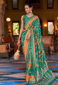 Patola silk Saree with blouse in Sea green colour 348B Desc: Saree Style : Patola SareesSaree Color : Sea Green Fabric : Patola Silk Work : Printed Wash Care : Dry clean Sleeve Style : Sleeveless Long Sleeves : Done only in Custom Stitch Sleeves Lining : Done only in Custom Stitch Bust Size : 32 to 42 Inches Occasion : Temple Wear Social Gathering Pongal Gudi Padwa Onam Ugadi. With Express Free Shipping Buy Indian Party wedding wear Bridal Sarees Patola silk Saree with blouse in Sea green colour Patola Saree Blouses Work, Patola Saree Blouses, Green Patola Saree, Blouses Work, Patola Silk Saree, Patola Sarees, Patola Saree, Designer Silk Sarees, Designer Sarees Collection